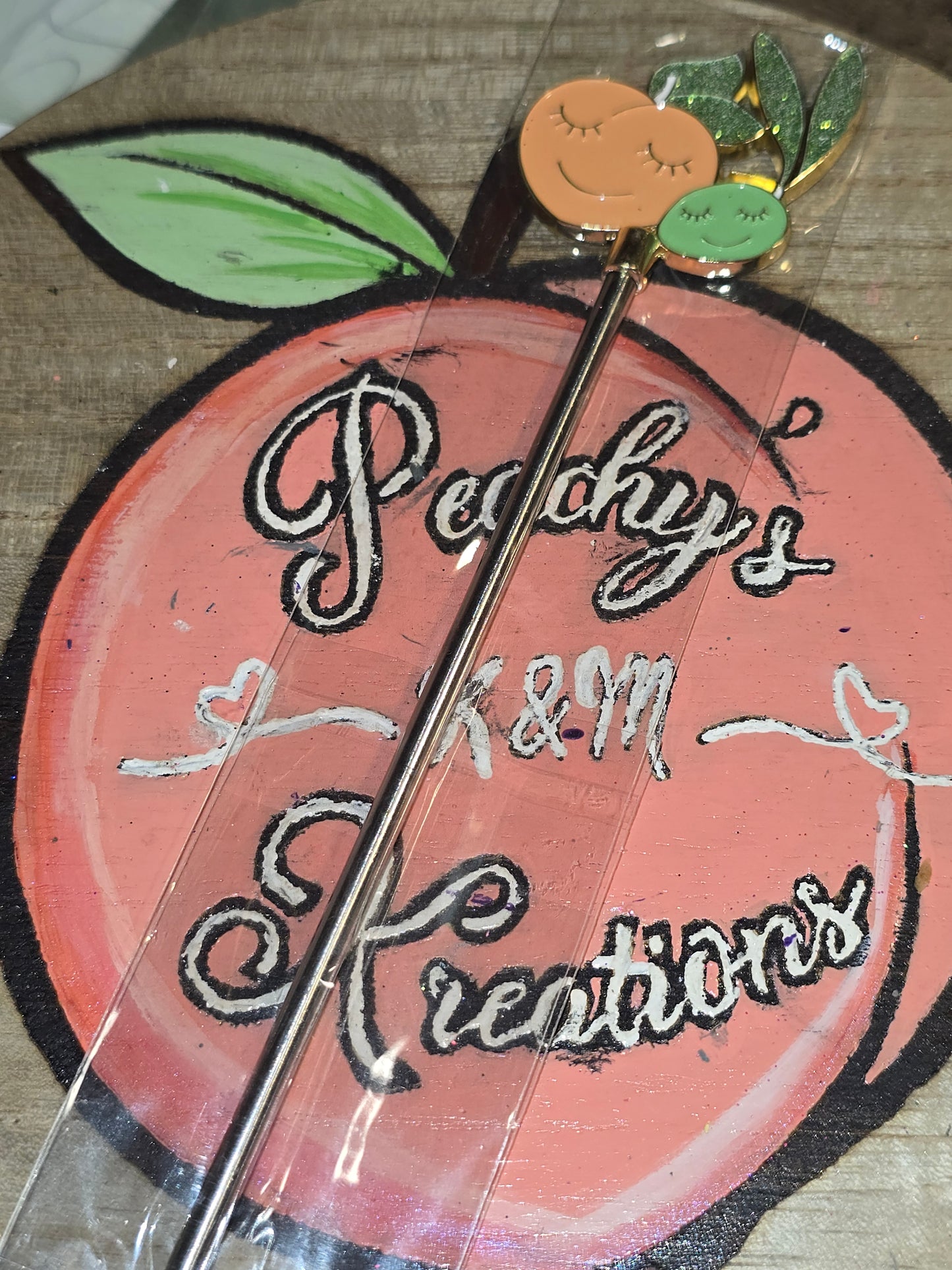 Peach metal stir stick