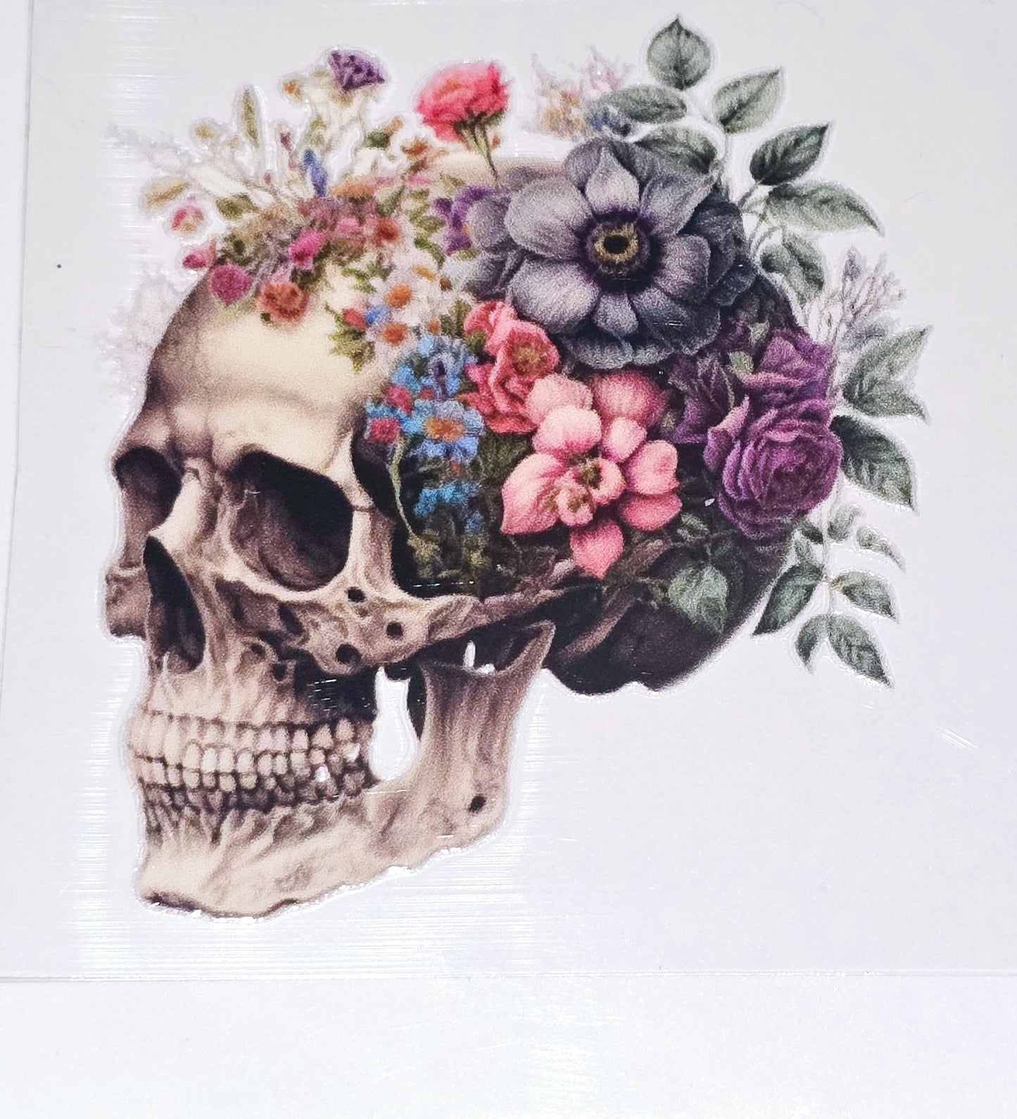 Floral skulls medium clear UV DTF